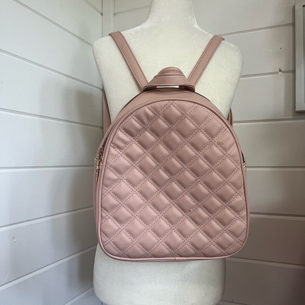 Fashion Backpack in Dusty Rose color and adjustable straps, Great condition